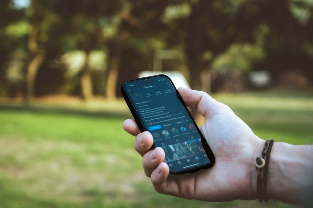 Person looking at their phone in hand