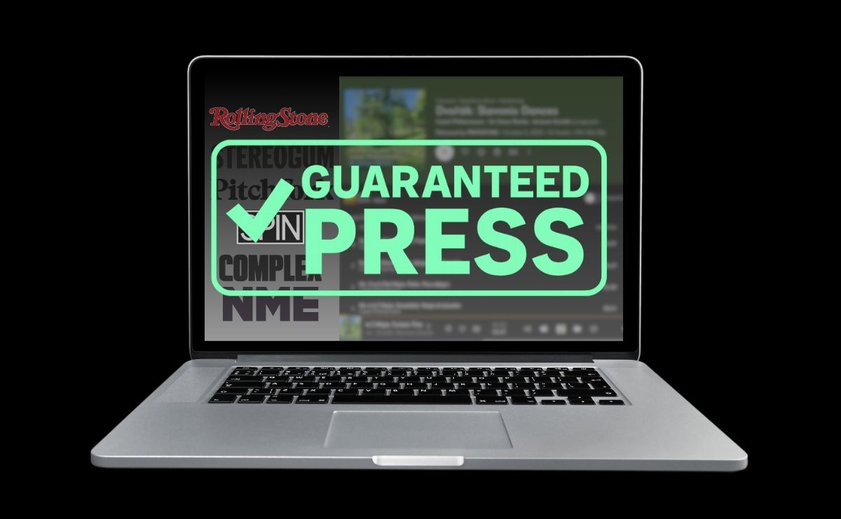 Laptop that displays "Guaranteed Press" across the screen